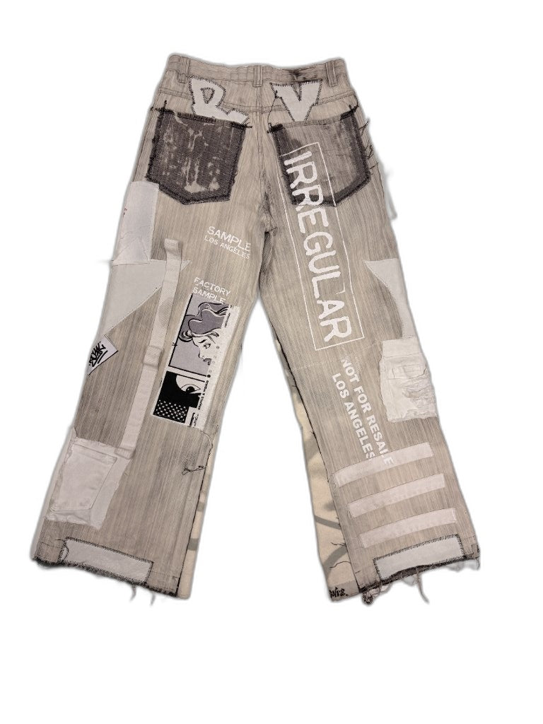 Back of deconstructed patchwork denim showing FACTORY SAMPLE LOS ANGELES screen print IRREGULAR stencil and NFR branding — one of one upcycled Not For Resale