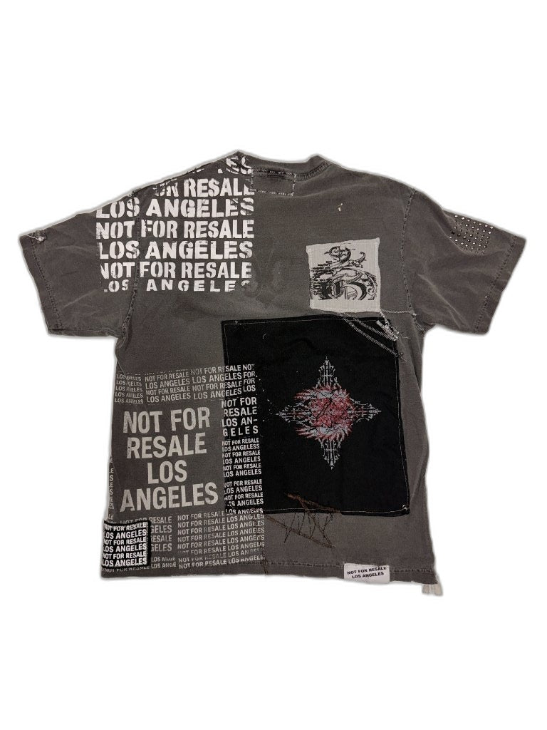 Back of grey reconstructed tee showing NOT FOR RESALE LOS ANGELES bold stencil all-over NFR text panels black gothic diamond patch and anchor crest patch — one of one upcycled NFR LA