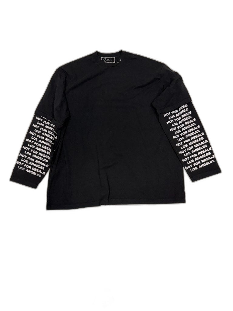 Back of black long sleeve tee showing repeating NOT FOR RESALE LOS ANGELES white text on both cuffs and clean oversized boxy silhouette — one of one upcycled Not For Resale Los Angeles