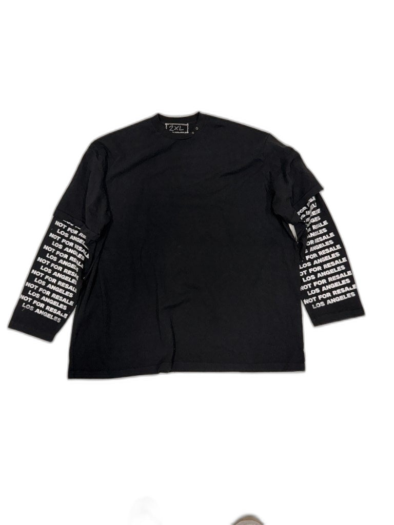 Front of black heavyweight long sleeve tee with NOT FOR RESALE LOS ANGELES repeating white text screen printed across both cuffs and NFR brand tag at collar — one of one reconstructed NFR LA
