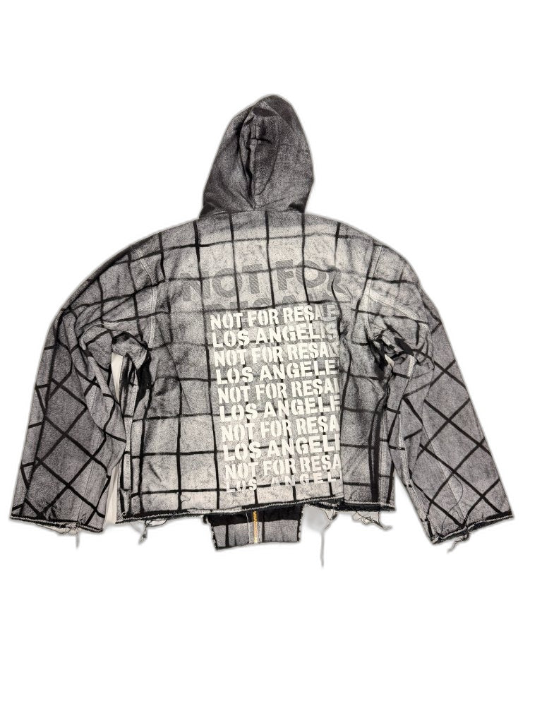 Back of grey grid print hooded jacket showing NOT FOR RESALE LOS ANGELES repeating stencil column over window pane grid fabric and raw frayed hem — one of one upcycled NFR LA