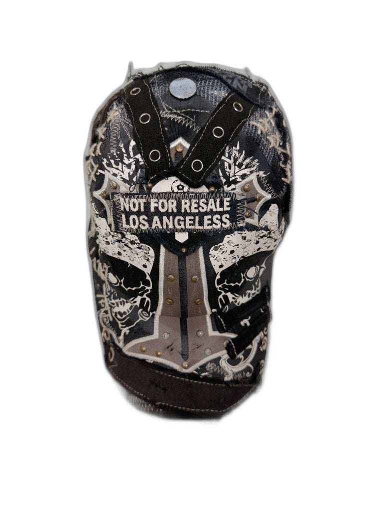 RECONSTRUCTED 001_26_06 — Black Skull Cap, Grommets, Gold Studs & NFR Patch
