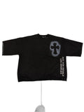 RECONSTRUCTED 001_26_33 — Black Boxy Cross-Patch Tee, Grommet Sleeves & NFR Vertical embroidery.